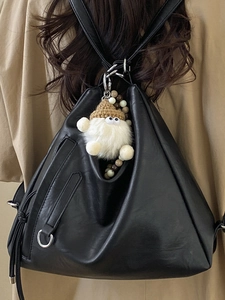 Retro black leather triangle backpack with plush pendant charm and vintage beads