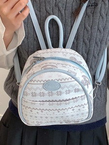 Blue and white mini student backpack with snowflake prints and adjustable straps