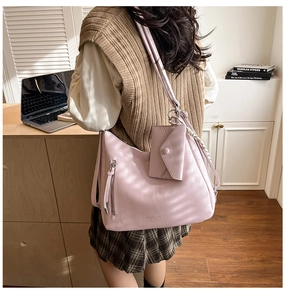 Grand sac cabas en cuir PU rose avec une mini pochette assortie et fermeture éclair latérale