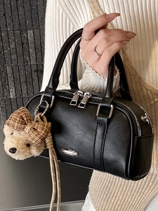 Retro black faux leather boston bag with bear pendant and silver double zipper details