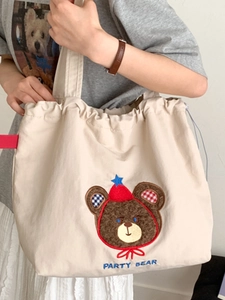 Retro canvas tote bag with Party Bear embroidery and drawstring closure for daily use