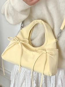 Pale yellow pleated cloud bag with bow knots and detachable shoulder strap in Korean style