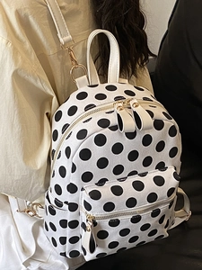 Japanese style white backpack with black polka dots featuring premium gold zippers and hardware