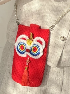 Mini Chinese New Year lion dance knitted crossbody bag with pearl chain and red tassels