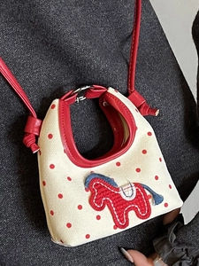 Mini polka dot canvas crossbody bag with red leather handles and cute horse embroidery