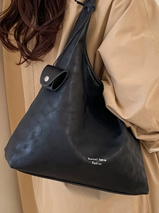 Grande borsa a tracolla in pelle nera minimalista da donna con cinturino a nodo moda