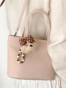 Pink lychee texture shoulder bag with cute teddy bear charm and elegant pearl chain strap