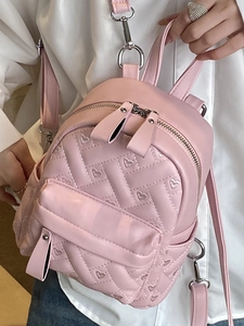 Rosa Mini-Rucksack mit Herz-Steppmuster und silbernen Metall-Reißverschlüssen für Damen