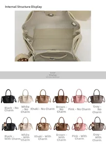 Detail view of the drawstring and magnetic closure on a lychee pattern bucket handbag