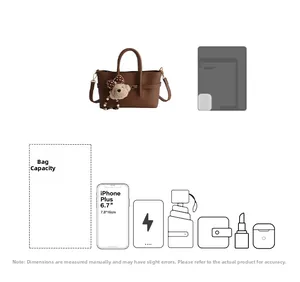 Detail view of the brown leather baguette bag capacity showing internal storage and charms