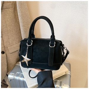 Black suede Boston bag with silver starfish charm and adjustable shoulder strap