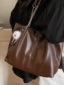 Vintage dark brown large tote bag with chain strap and cute plush charm detail
