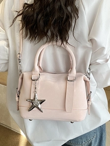 Minimalist light pink pillow bag for women with silver star charm and crossbody strap