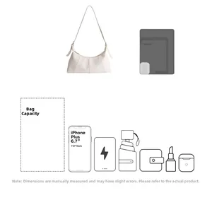 Detail showing high capacity of white leather crescent bag fitting a 6.7 inch smartphone