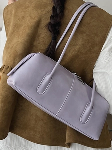Borsa a spalla baguette lilla minimalista con manici lunghi per un look alla moda