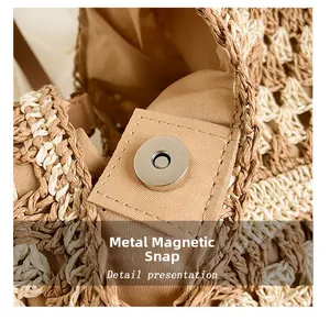 Detailed macro view of the silver magnetic snap closure on a woven tote bag lining