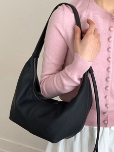 Minimalist black leather crescent hobo bag for women with smooth shoulder strap