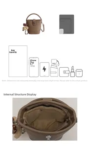 Detailed interior view of brown bucket bag showing large capacity and inner pockets
