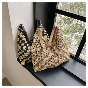 Detailed texture of handcrafted woven hobo bags with premium leather shoulder straps