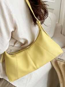Chic lemon yellow lychee leather dumpling shoulder bag for women commuter style