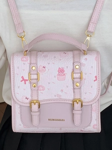 Pink preppy backpack with cartoon prints and metallic buckles shown on person