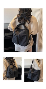 Detail of black nylon multi-pocket bag showing drawstring closure and water-resistant texture