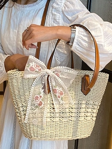 Handwoven straw tote bag with lace bow and rose embroidery for summer beach vacation