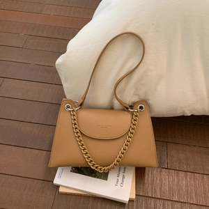 Detail of khaki brown lychee leather bag with silver chain and brand embossing