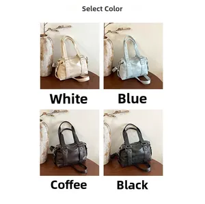 Detail view of vintage Boston pillow bags in white, blue, coffee, and black PU leather