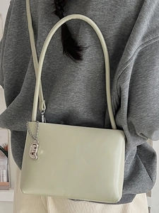 Chic light green minimalist shoulder bag with matte finish and stylish silver chain detail