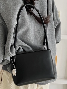 Minimalist black matte leather underarm bag with silver fashion chain and shoulder strap