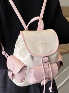 Women's vintage two-tone faux leather backpack with silver buckles and drawstring detail