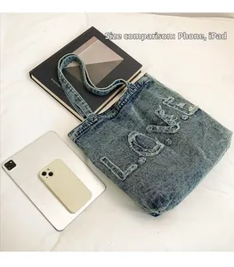 Retro denim tote bag size comparison with Phone and iPad showing large capacity