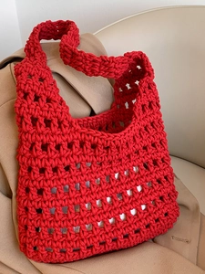 Handmade red woven tote bag with hollow mesh pattern for casual beach and spring commute