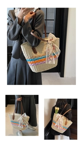 Detail of hand-woven straw tote with colorful stripes and floral lace bow decoration