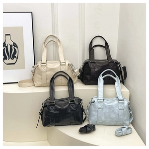 Collection of minimalist leather Boston bags in beige, brown, black and blue colors