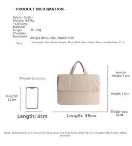 Quilted laptop tote bag detail showing 38x27cm dimensions and iPhone size comparison