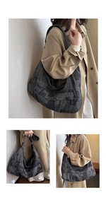 Detail of the high-capacity tote bag featuring a textured grey plaid jacquard fabric