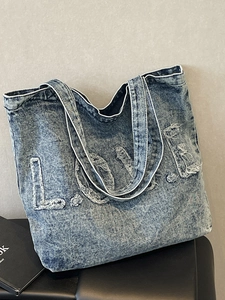 Vintage dark blue washed denim tote bag with frayed LOVE embroidery and dual handles