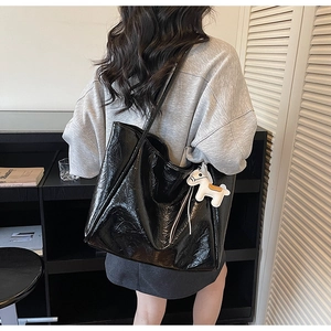 Chic large capacity black patent leather tote bag with cute white horse charm detail