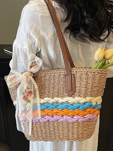 Handwoven large straw tote bag with colorful stripes and floral lace ribbon for summer