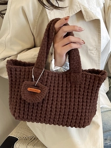Vintage brown waffle knit underarm tote bag with handmade leather tag and stylish handle