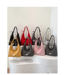 Collection of various pleated handle tote bags in assorted colors and patterns