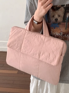 Minimalist light pink quilted tote bag with square pattern for laptop and daily commute