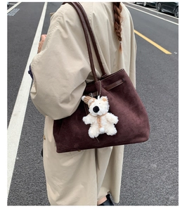 Brown suede tote bag with cute white teddy bear charm and large capacity for women