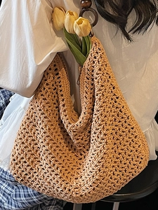 Handwoven khaki tote bag with wooden ring handles and tulip accents for summer beach beach
