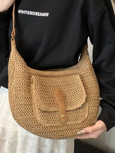 Large straw hobo bag with leather strap and front pocket for summer vacation style