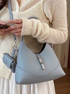 Light blue lychee grain leather hobo shoulder bag with silver buckle and mini pouch charm