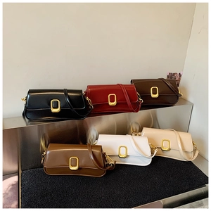 Selection of structured square shoulder bags in six colors with gold oval metal buckles