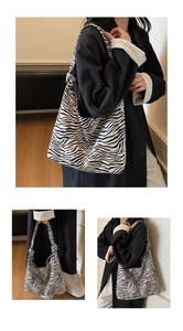 Detail shots of black and white zebra print canvas tote bag from multiple angles